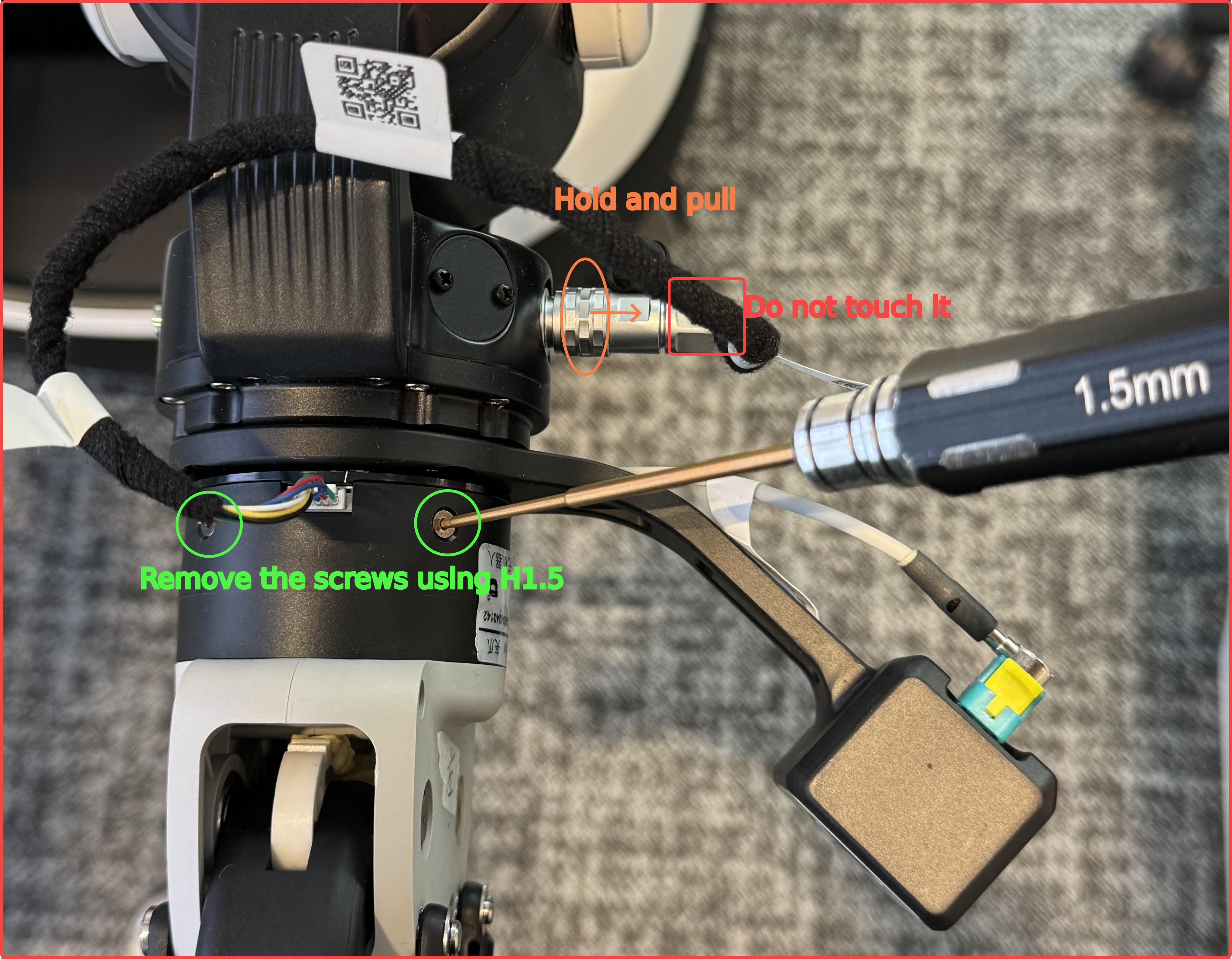 Once the screws are removed, slowly pull the end-effector outward to detach it.